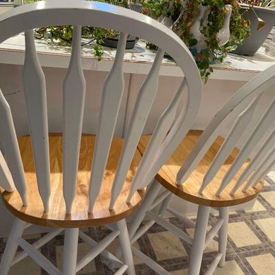 2 white wood stools