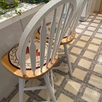 2 white wood stools