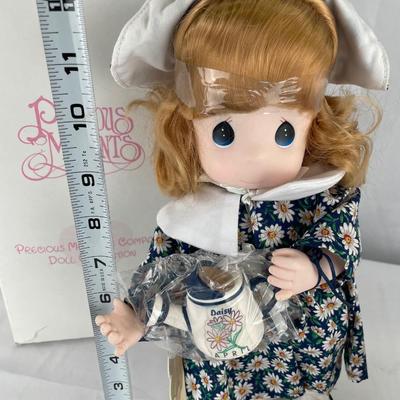 Precious Moments doll and Easter Musical Figure