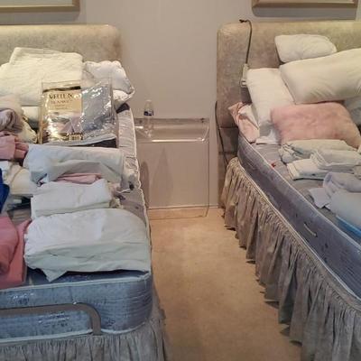 2 Twin Beds and Everything on them.