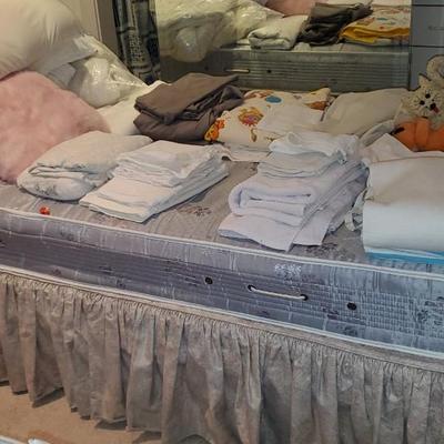 2 Twin Beds and Everything on them.