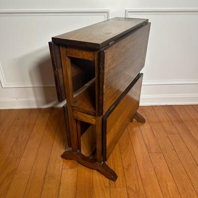 LOT 217: Vintage Two Tier Drop Leaf Table