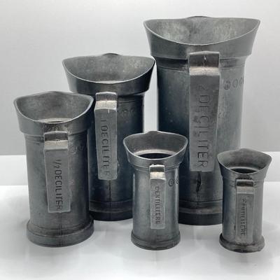 LOT 248: Vintage Dutch Pewter Measuring Cups, Metric System (Alphabet Themed) and Guide to American Pewter Book