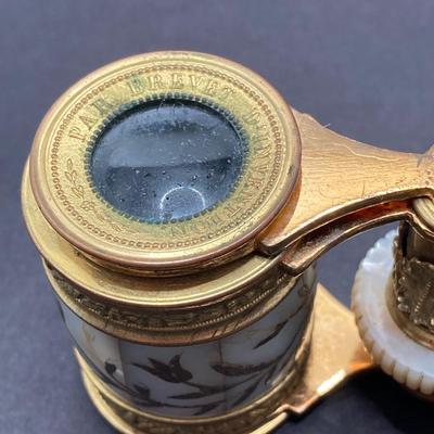 LOT 252: Pair of Stunning Mother of Pearl Opera Glasses with Cases - French Par Brevet Dinvention and Swift Princess 25X Model No 726