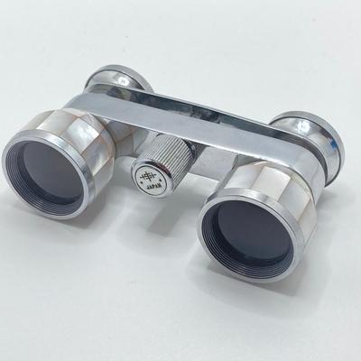 LOT 252: Pair of Stunning Mother of Pearl Opera Glasses with Cases - French Par Brevet Dinvention and Swift Princess 25X Model No 726