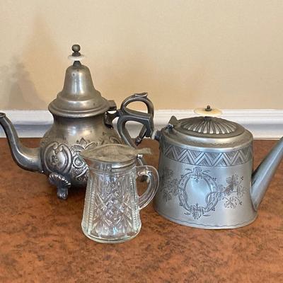 LOT 256: Vintage Silver Plated / Pewter Tea Pots and Cut Crystal Creamer