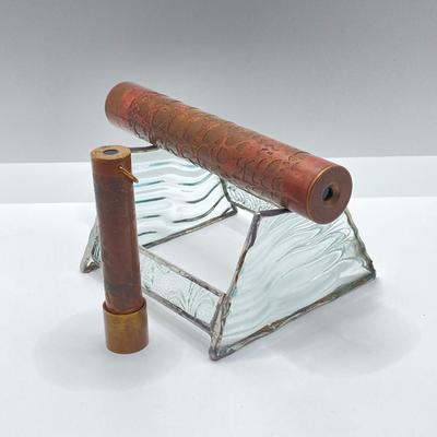 LOT 257: Pair of Vintage Brass and Copper Kaleidoscopes (1983 1728 and 1984 1538) with Glass Holding Stand