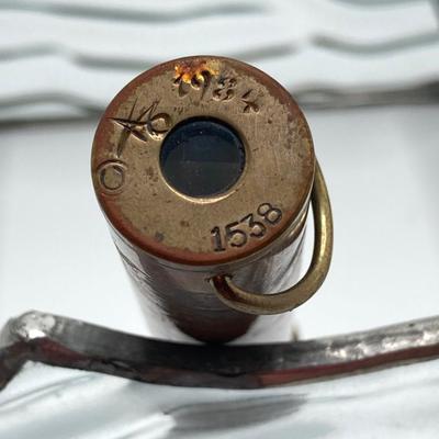 LOT 257: Pair of Vintage Brass and Copper Kaleidoscopes (1983 1728 and 1984 1538) with Glass Holding Stand