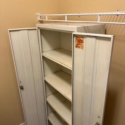 LOT 387: 2 Two Door Steel Cabinets