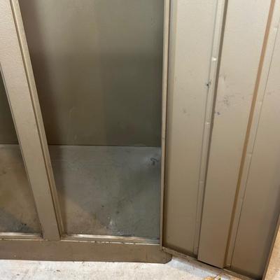 LOT 387: 2 Two Door Steel Cabinets