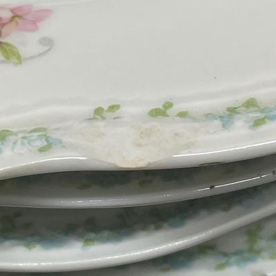 A Lanternier Limoges 11 Dinner plates