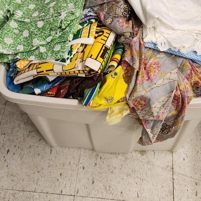 Big bin of vintage fabric folds