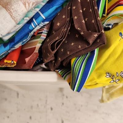Big bin of vintage fabric folds
