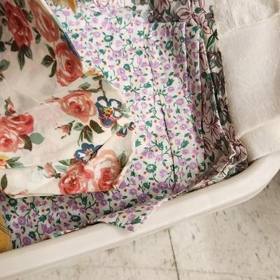 Big bin of vintage fabric folds