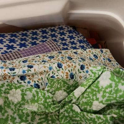 Big bin of vintage fabric folds