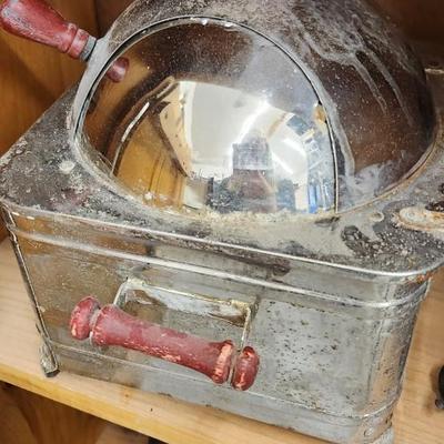 Cabinet complete with vintage popcorn makers and dairy can