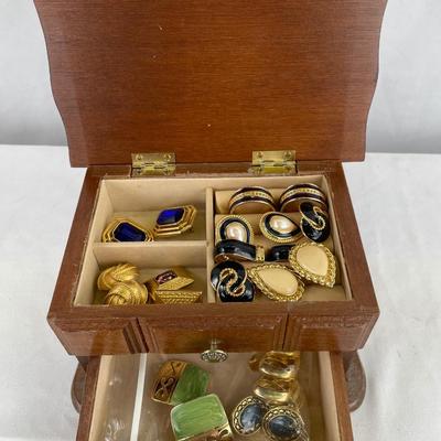 Small jewelry box with gold tone post earrings
