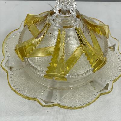 Pressed glass butter dish with yellow trim