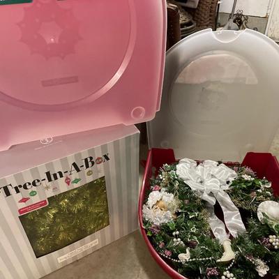 Lighted tinsel tree, wreath, and two wreath storage boxes