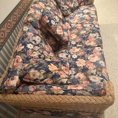 Wicker accent floral pattern sofa