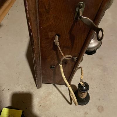 Antique hand crank wall phone with gold working bell
