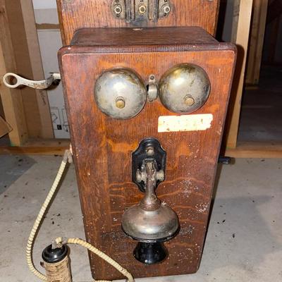 Antique hand crank wall phone with gold working bell