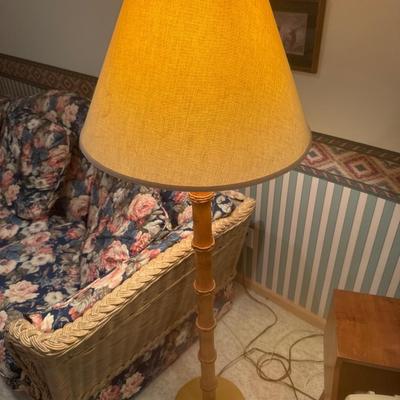 2 similar style bamboo floor lamps