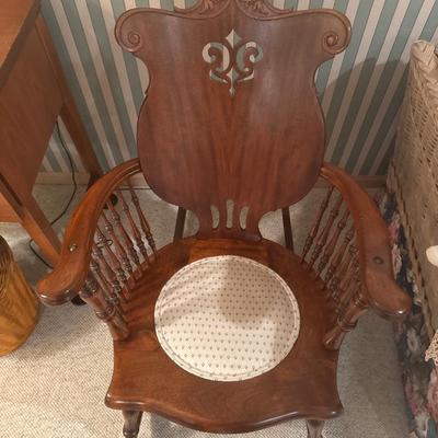Wooden in unique pattern rocking chair with doll