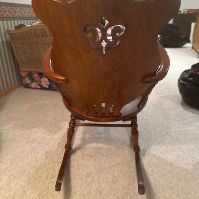 Wooden in unique pattern rocking chair with doll