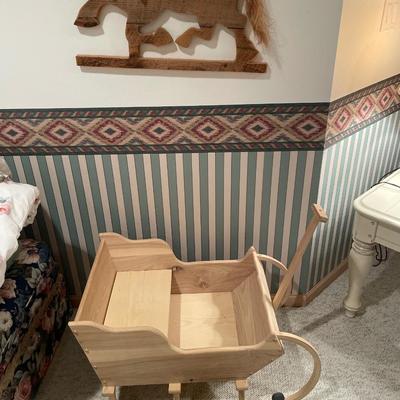 Rocking horse and wood sleigh decor