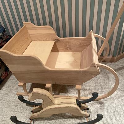 Rocking horse and wood sleigh decor