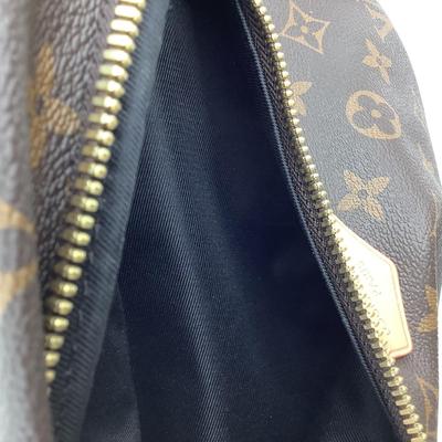 219 New LOUIS VUITTON Monogram Leather Bum Bag.