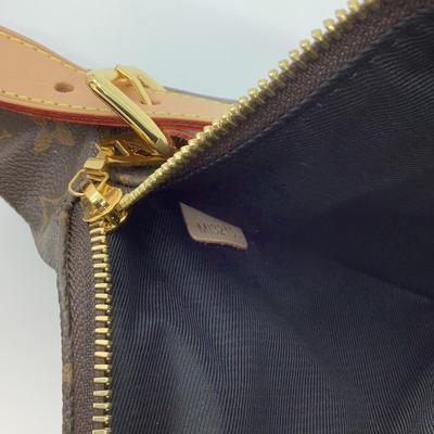 219 New LOUIS VUITTON Monogram Leather Bum Bag.