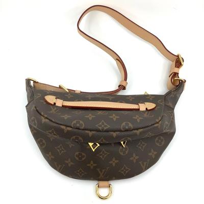 219 New LOUIS VUITTON Monogram Leather Bum Bag.