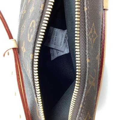 219 New LOUIS VUITTON Monogram Leather Bum Bag.