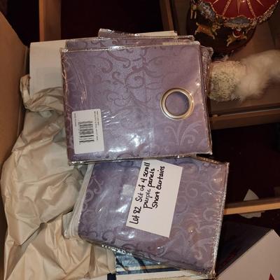 4 still in package Scroll patterned purple curtains