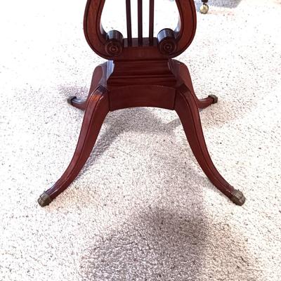 ANTIQUE MAHOGANY HARP TABLE W/BRASS CLAW FEET AND INLAID TOP