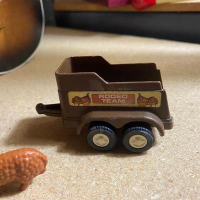 HARMONY UKULELE WITH INSTRUCTION BOOKS, TOOTSIE TOY TRUCK AND TRAILER WITH FARM ANIMALS
