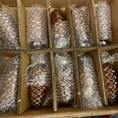 Pinecone ornaments, candles. Wine light wicks,etc