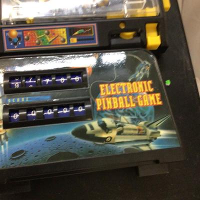 Space Shuttle Pin Ball Machine and Easy Money Board Games.