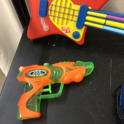 Spider Man, Light Speed Car, Little Tikes Guitar, Super Streamer Squirt Gun