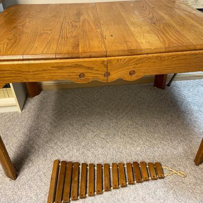 Vintage wood table with homemade xylophone