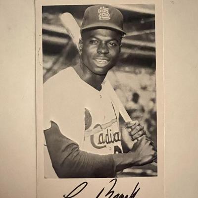Lou Brock facsimile signed photo. 3x5 inches
