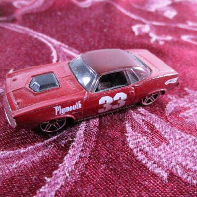 3 Hot Wheels cars, 1 Mattel car, 1 Disney car