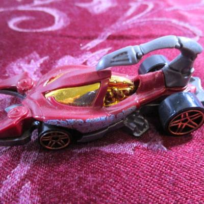 3 Hot Wheels cars, 1 Mattel car, 1 Disney car