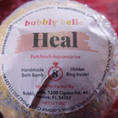 2 Bubbly Belle handmade bath bomb, hidden ring inside
