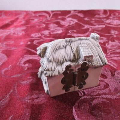 Handmade in Scotland hinged house with family inside