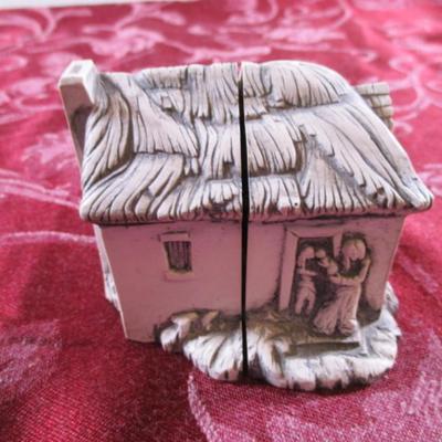 Handmade in Scotland hinged house with family inside