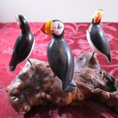 3 puffins figurine on burlwood