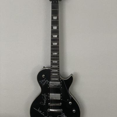 The Eagles band signed guitar 